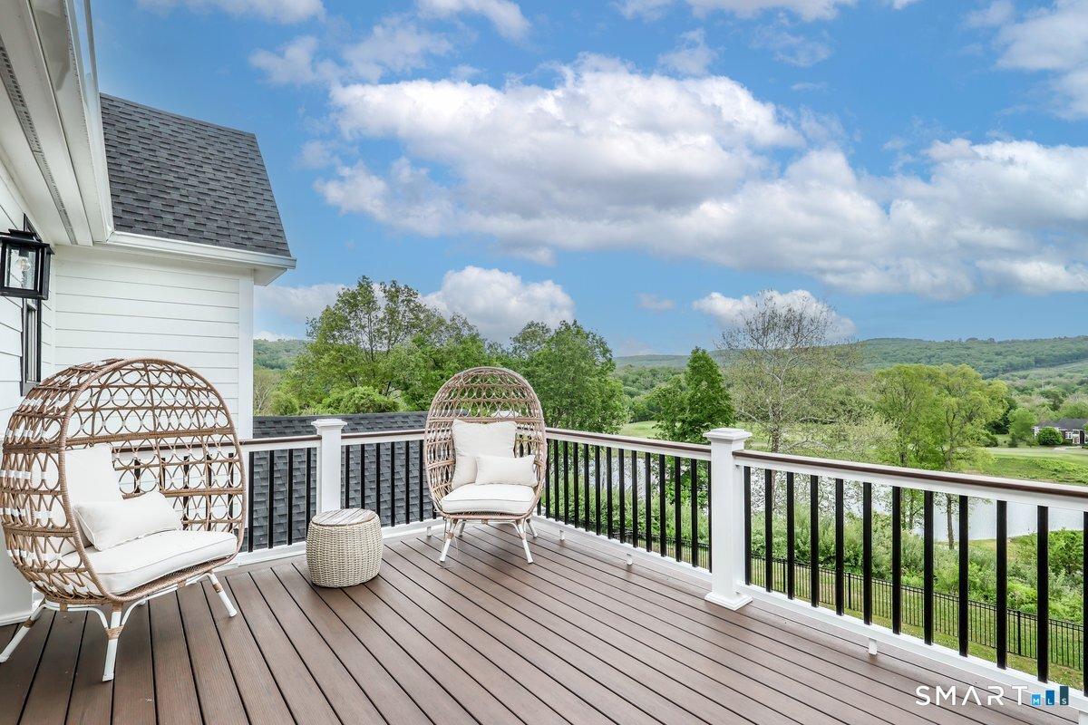 2 Pond View Lane Sherman, CT 06784 - Photo 24 of 40 a view of balcony with wooden floor