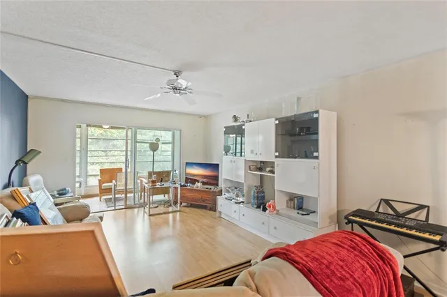 a room with furniture and a flat screen tv