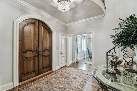 a bedroom with bed or furniture and a chandelier