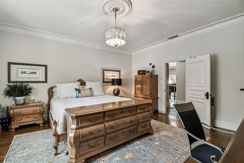 a view of walk in closet with clothes