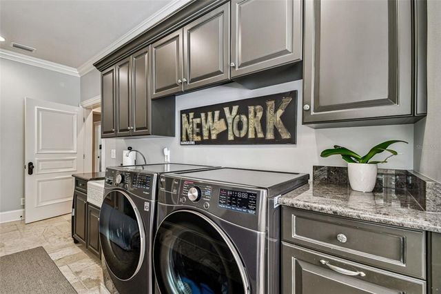 a bathroom with a sink a mirror and a shower