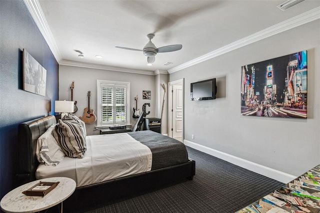 a front view of house with swimming pool and patio