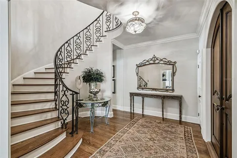 a bathroom with a sink double vanity and a mirror