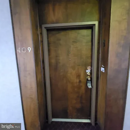 a bathroom with a glass door