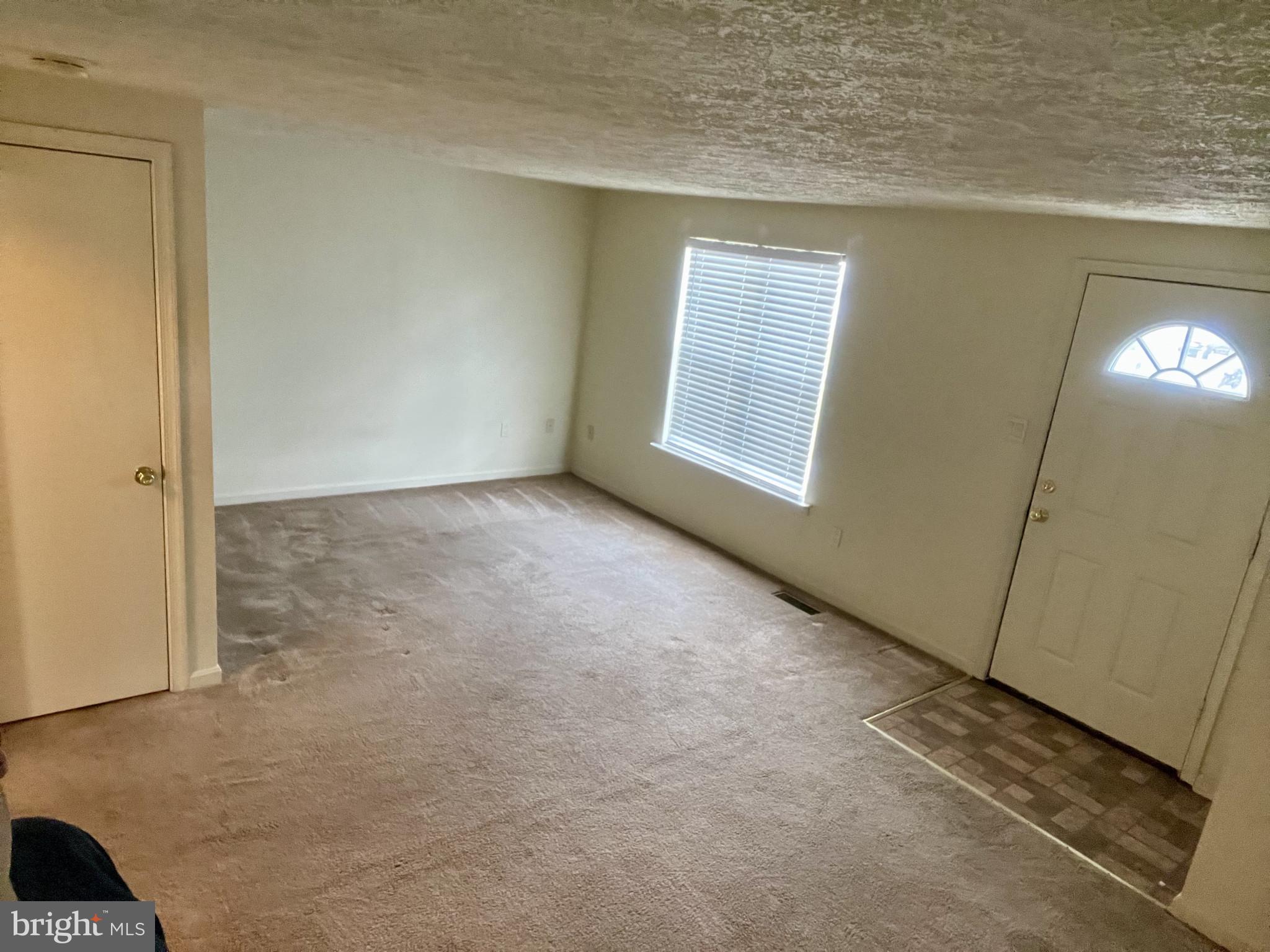 1463 Mobley Court Frederick, MD 21701 - Photo 11 of 32 an empty room with windows