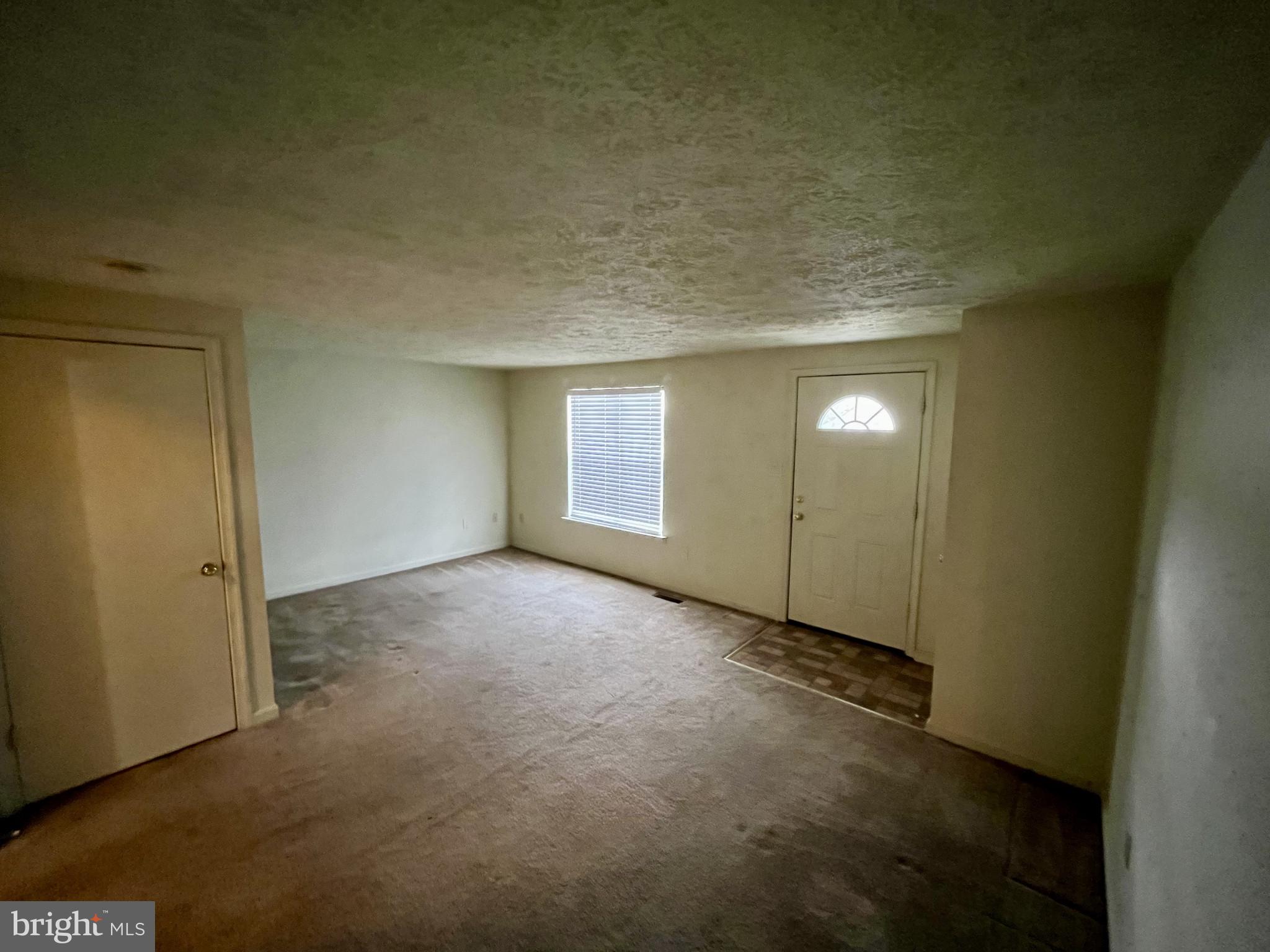 1463 Mobley Court Frederick, MD 21701 - Photo 12 of 32 a view of an empty room and window