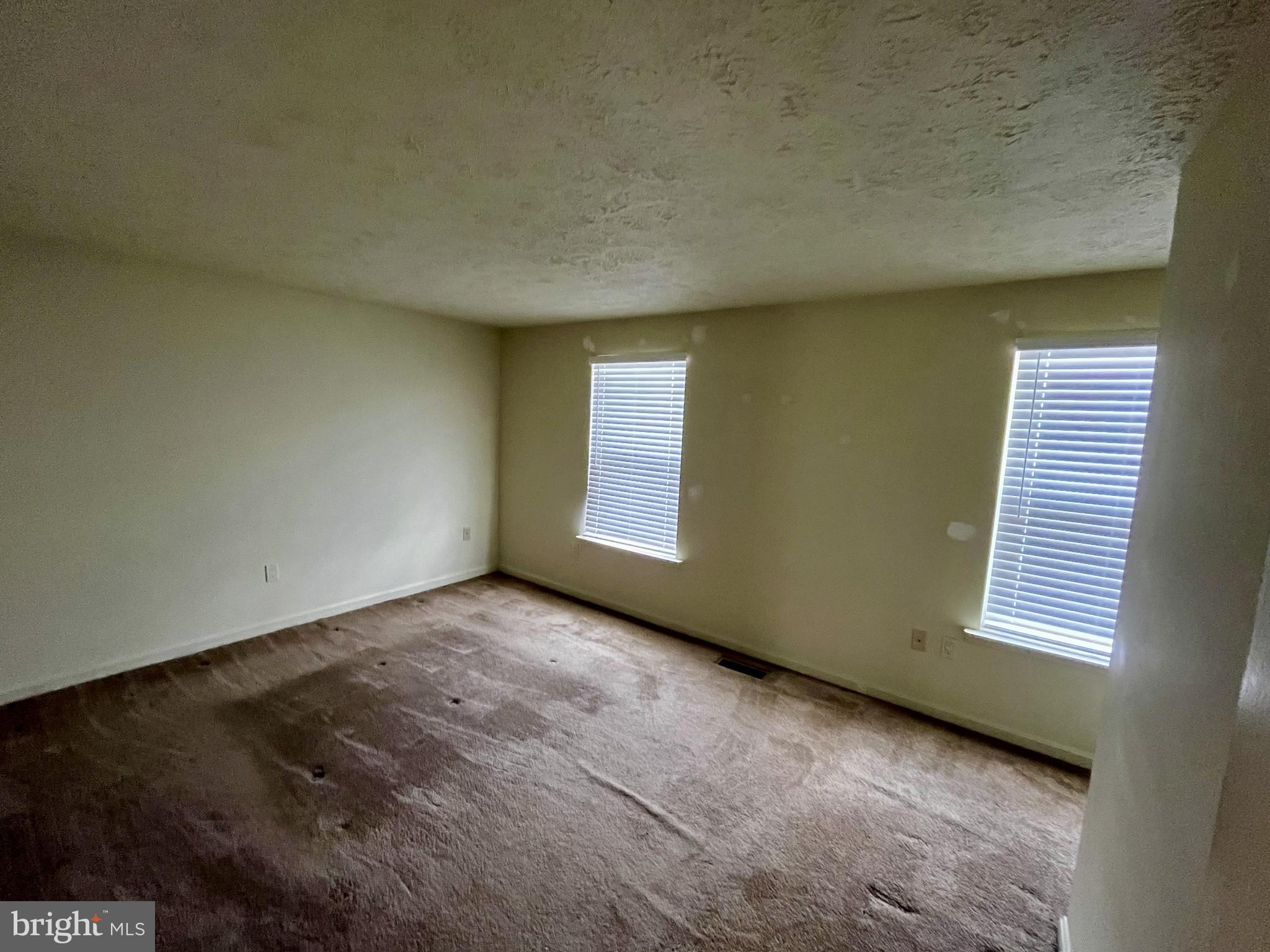 1463 Mobley Court Frederick, MD 21701 - Photo 20 of 32 an empty room with windows
