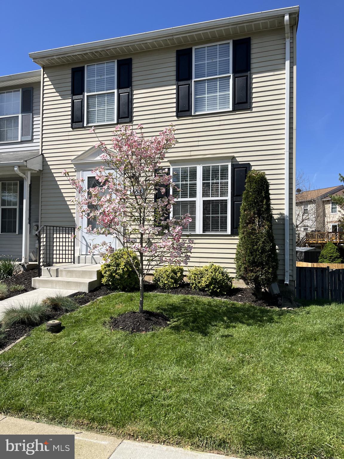 1463 Mobley Court Frederick, MD 21701 - Photo 2 of 32 a front view of a house with a yard and garage