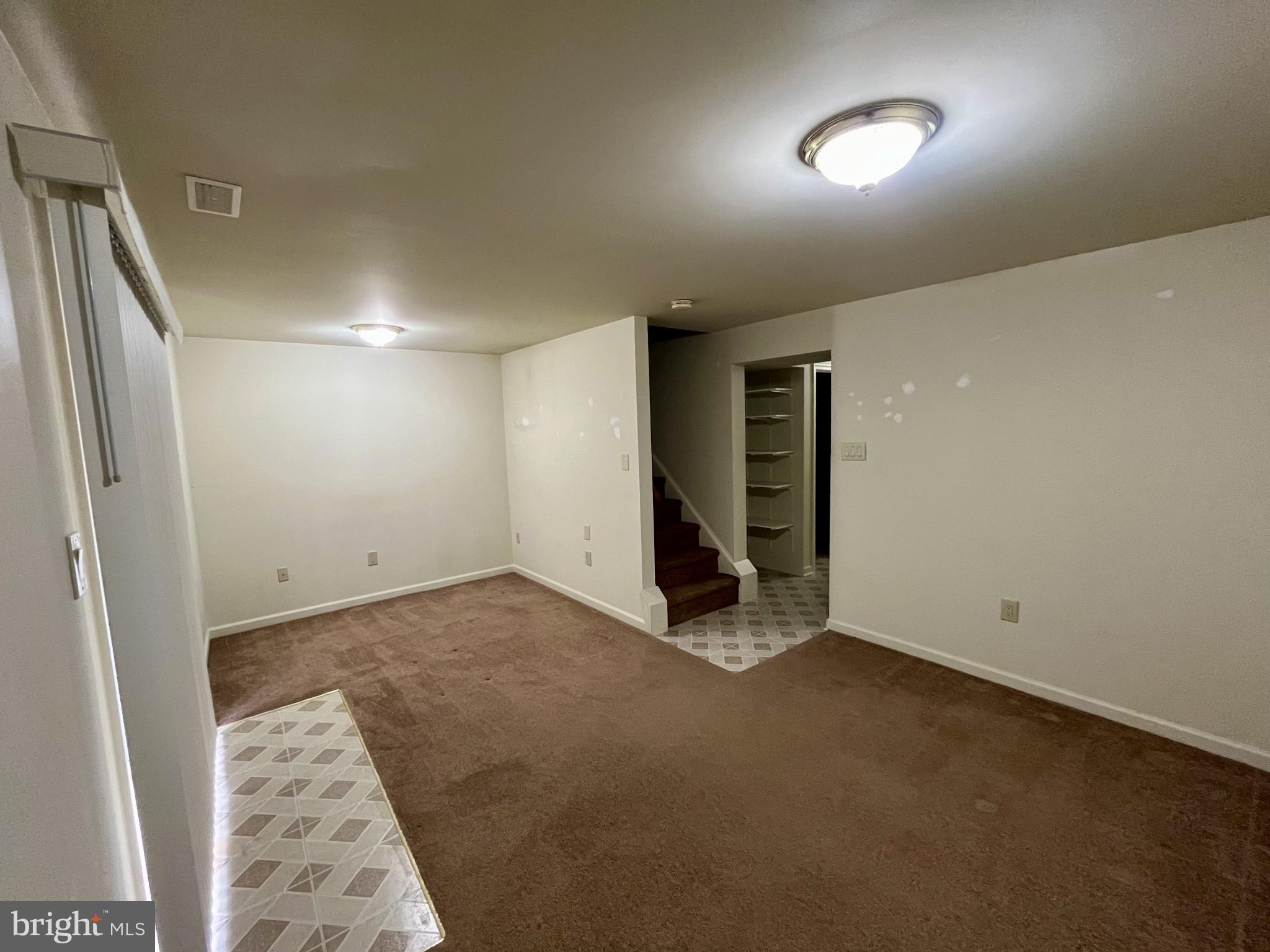 1463 Mobley Court Frederick, MD 21701 - Photo 25 of 32 an empty room with a empty space and windows