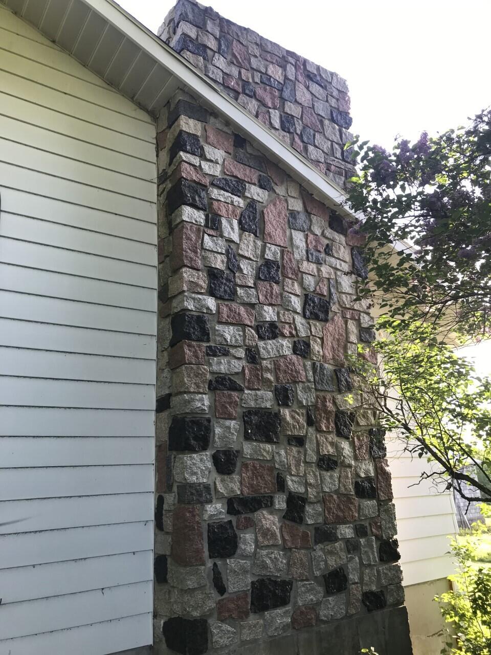 469 Albion Road Unity, ME 04988 - Photo 6 of 56 Stone chimney and side of house