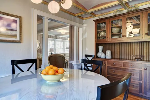 a kitchen with a table and chairs