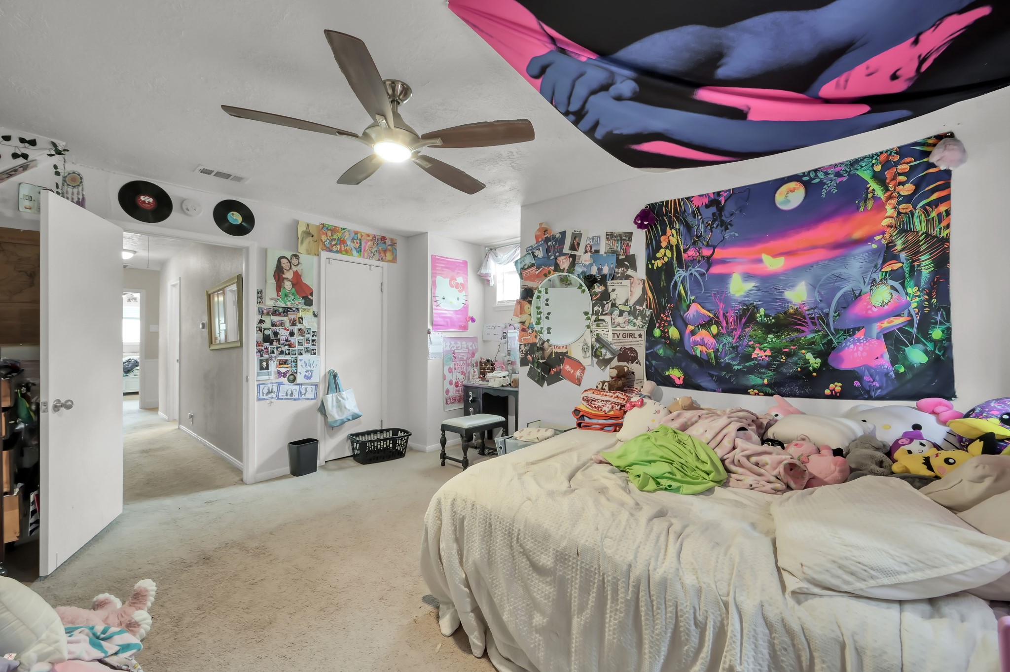 25610 Walnut Grove Circle Spring, TX 77380 - Photo 26 of 29 a bedroom with a bed and a flat screen tv
