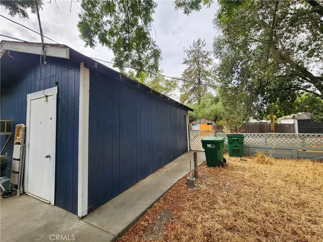 a view of a backyard with a patio