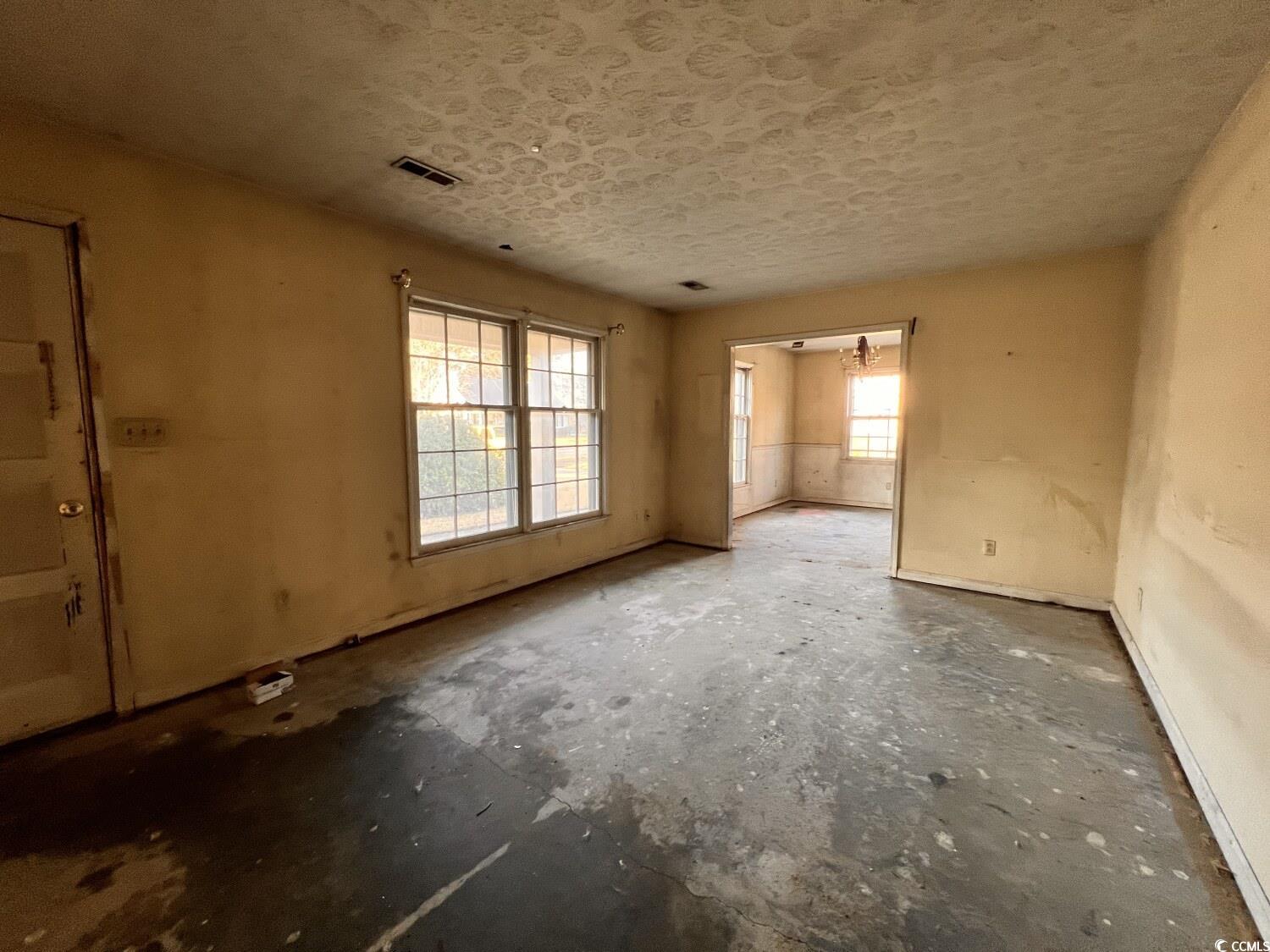 33 Plantation Road Myrtle Beach, SC 29588 - Photo 7 of 22 Unfurnished bedroom featuring multiple windows