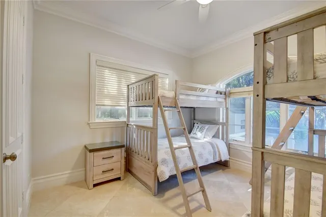 a view of a livingroom with furniture and staircase