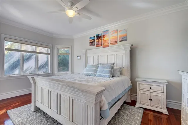 a bathroom with a granite countertop sink mirror toilet and bathtub