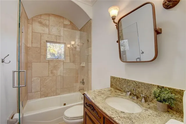 a view of a swimming pool with a yard and palm trees