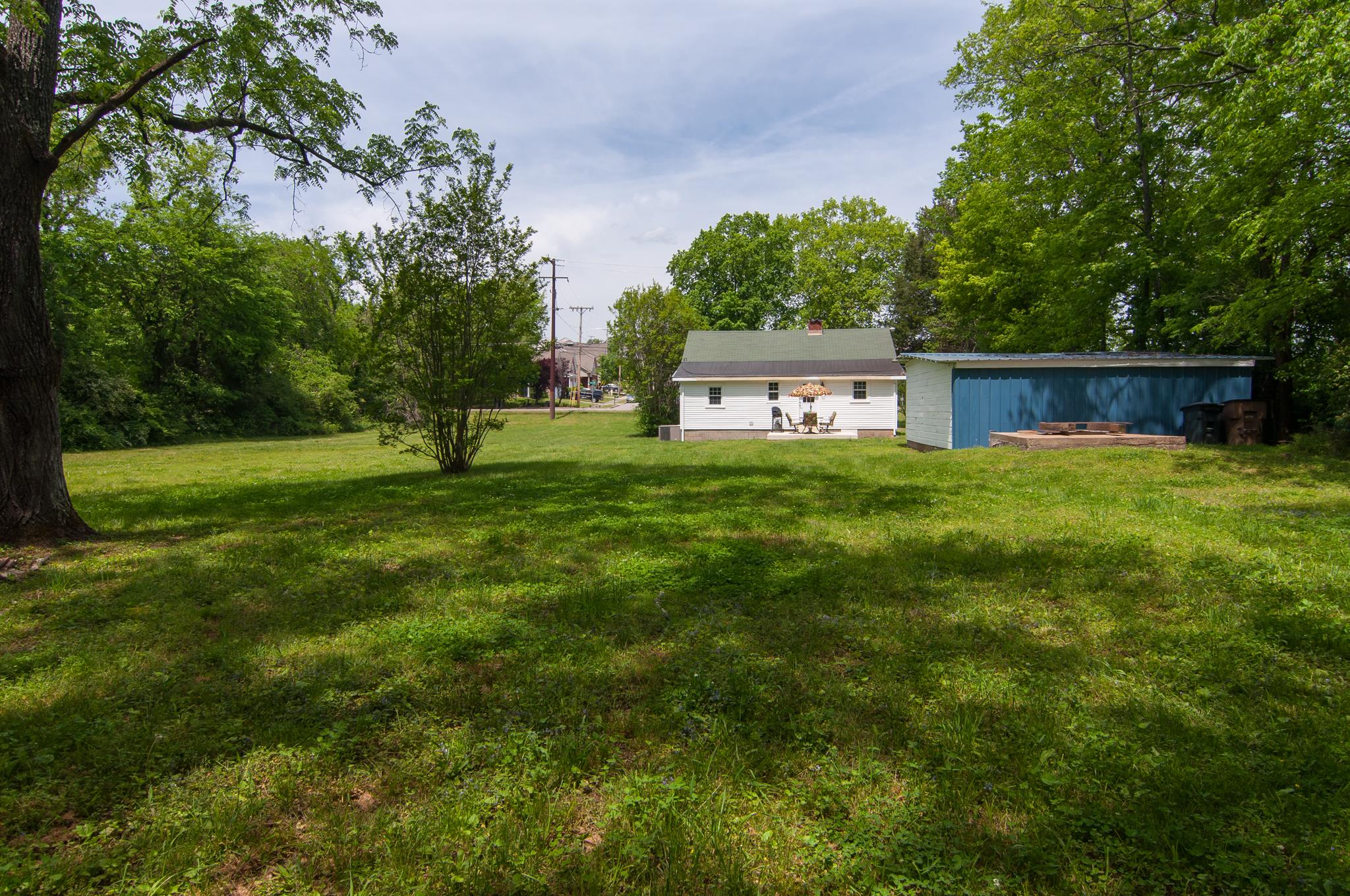4455 Cato Road Nashville, TN 37218 - Photo 23 of 30 Rear view of the house and garage.