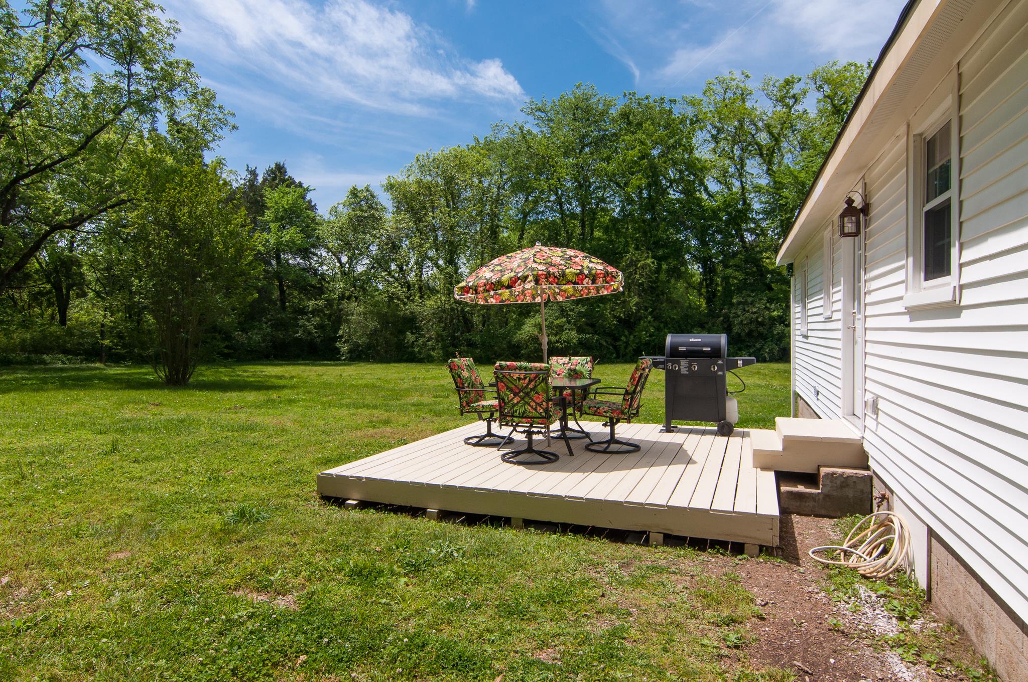4455 Cato Road Nashville, TN 37218 - Photo 24 of 30 New deck and the grill and patio set remain.