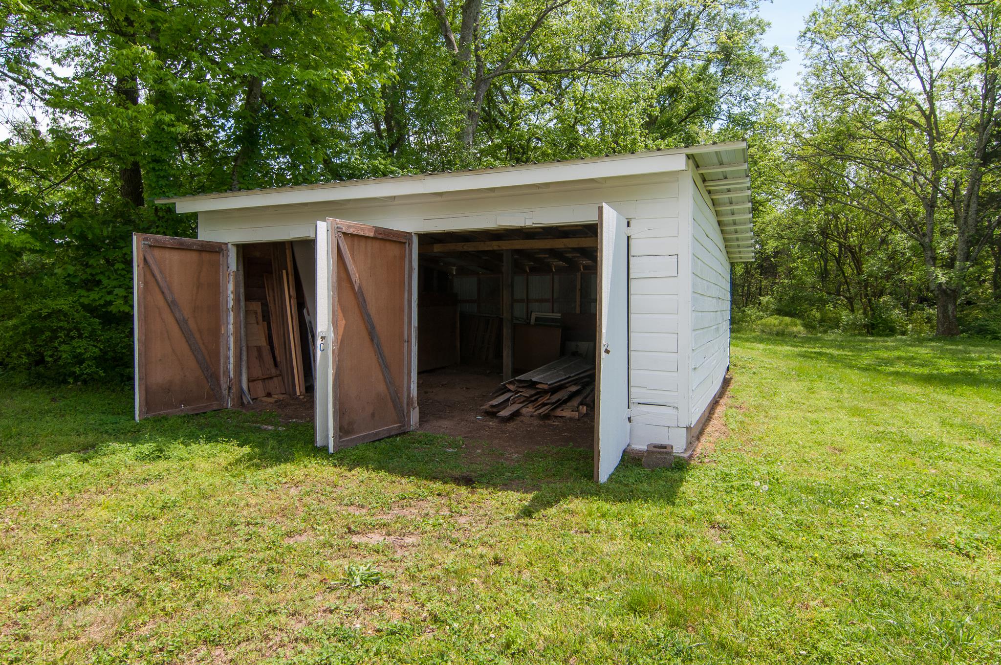 4455 Cato Road Nashville, TN 37218 - Photo 29 of 30 View of the garage with doors open.