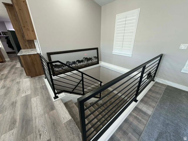 2350 North 1075 West Helper, UT 84526 - Photo 4 of 49 Stairs with wood finished floors and baseboards