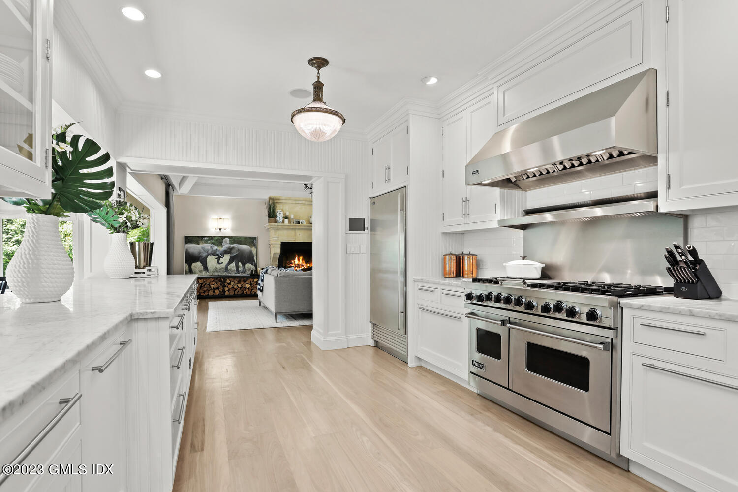 101 Perkins Road Greenwich, CT 06830 - Photo 11 of 41 a kitchen with stainless steel appliances a stove a sink and a refrigerator