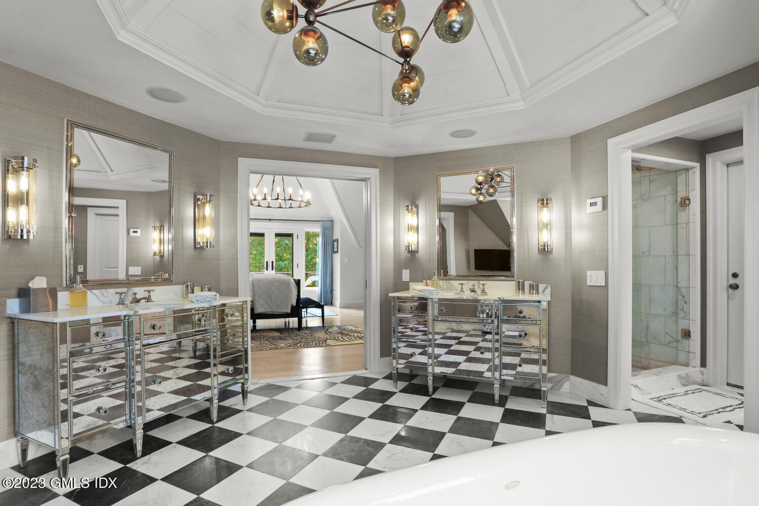 101 Perkins Road Greenwich, CT 06830 - Photo 16 of 41 a bathroom with a double vanity sink mirror and shower