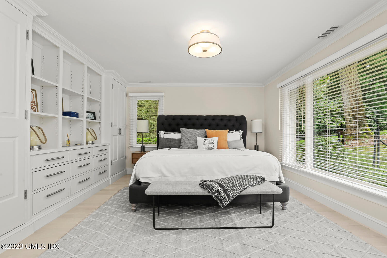 101 Perkins Road Greenwich, CT 06830 - Photo 22 of 41 a bedroom with a bed and window