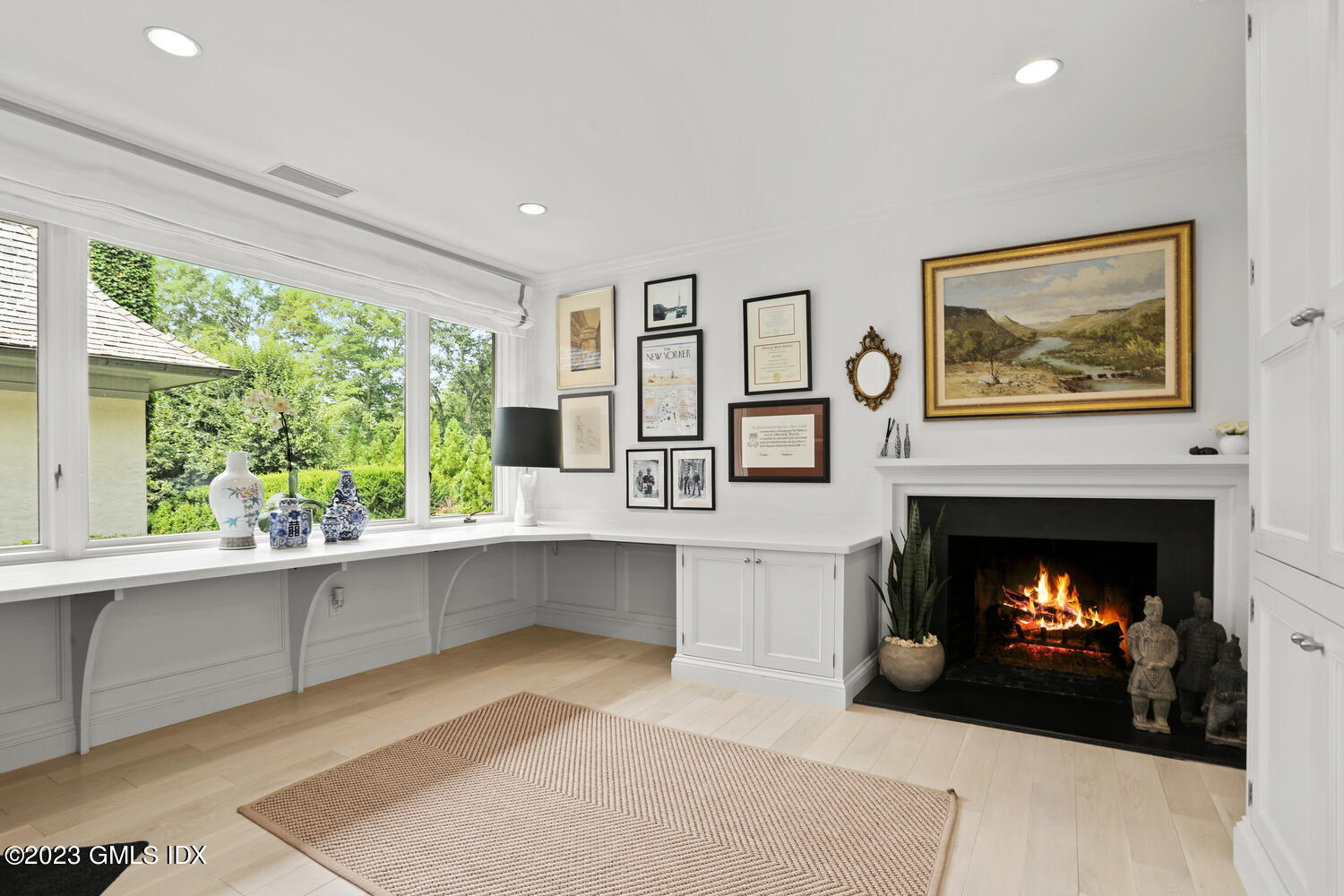101 Perkins Road Greenwich, CT 06830 - Photo 26 of 41 a living room with furniture and a fireplace