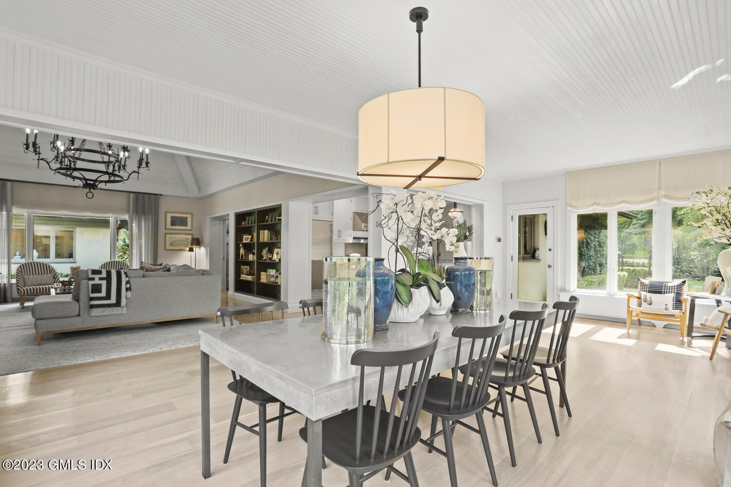 101 Perkins Road Greenwich, CT 06830 - Photo 8 of 41 a view of a dining room with furniture window and wooden floor