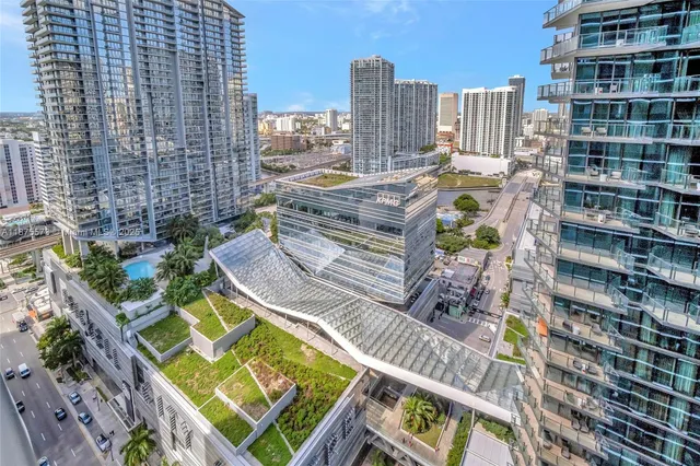 a view of swimming pool with seating area