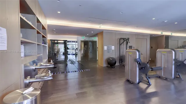 a view of a house with roof deck and sitting area