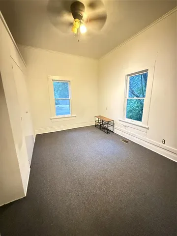 a view of a room with a window