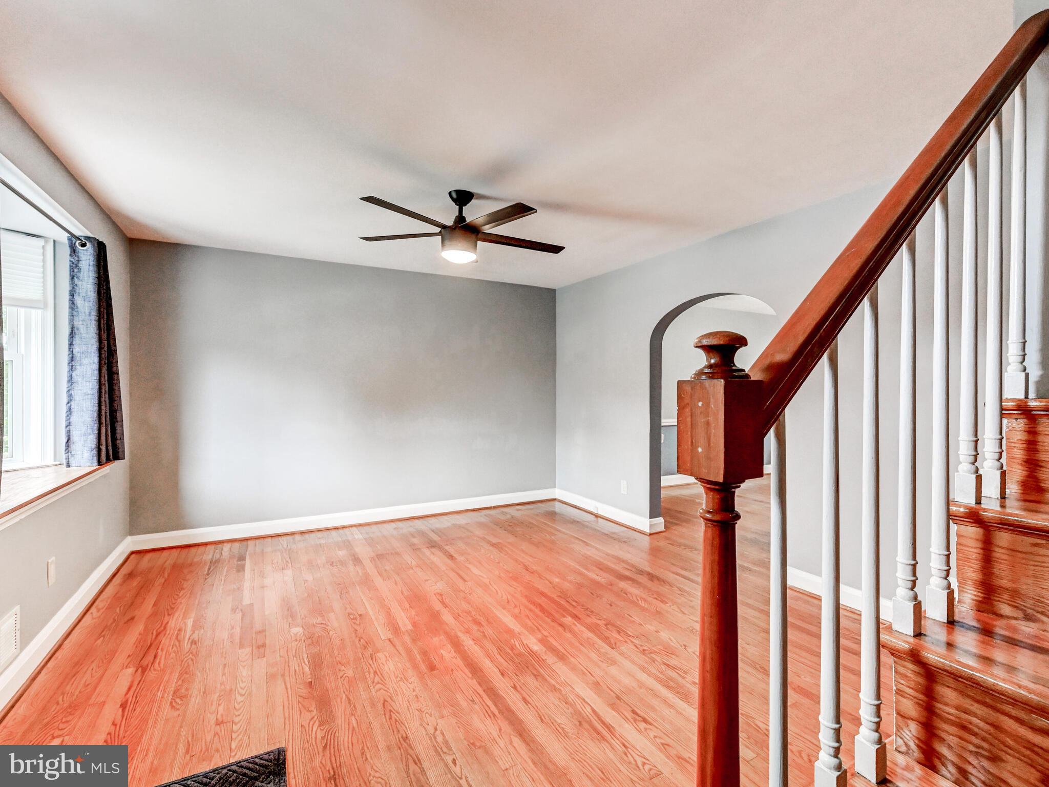 1636 Thetford Road Baltimore, MD 21286 - Photo 16 of 40 a view of an empty room with wooden floor and a window