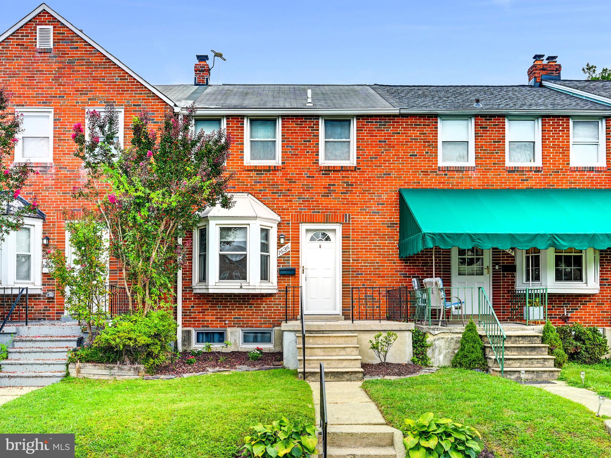 1636 Thetford Road Baltimore, MD 21286 - Photo 2 of 40 front view of a house with a yard