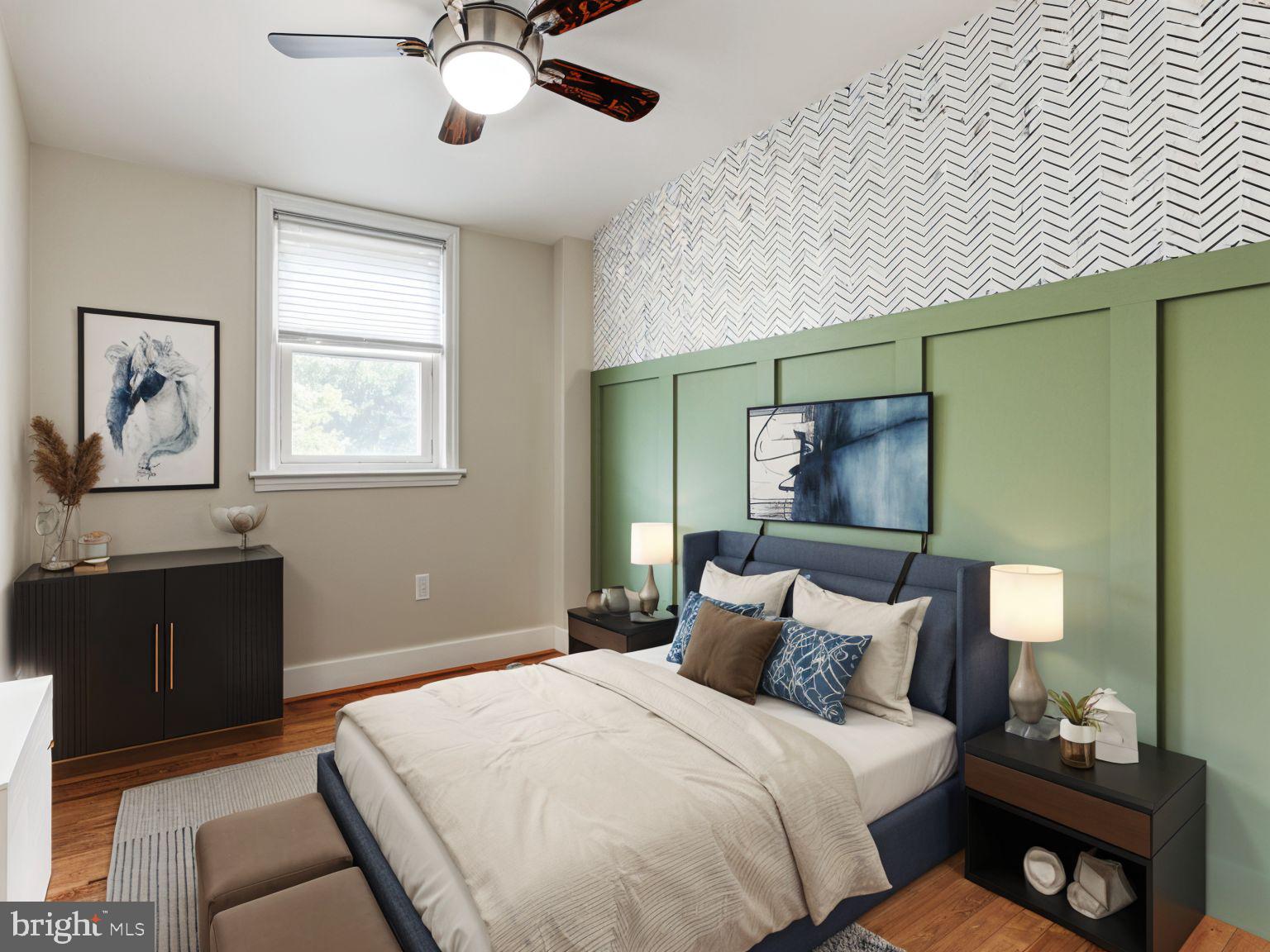 1636 Thetford Road Baltimore, MD 21286 - Photo 23 of 40 a bedroom with bed and wooden floor