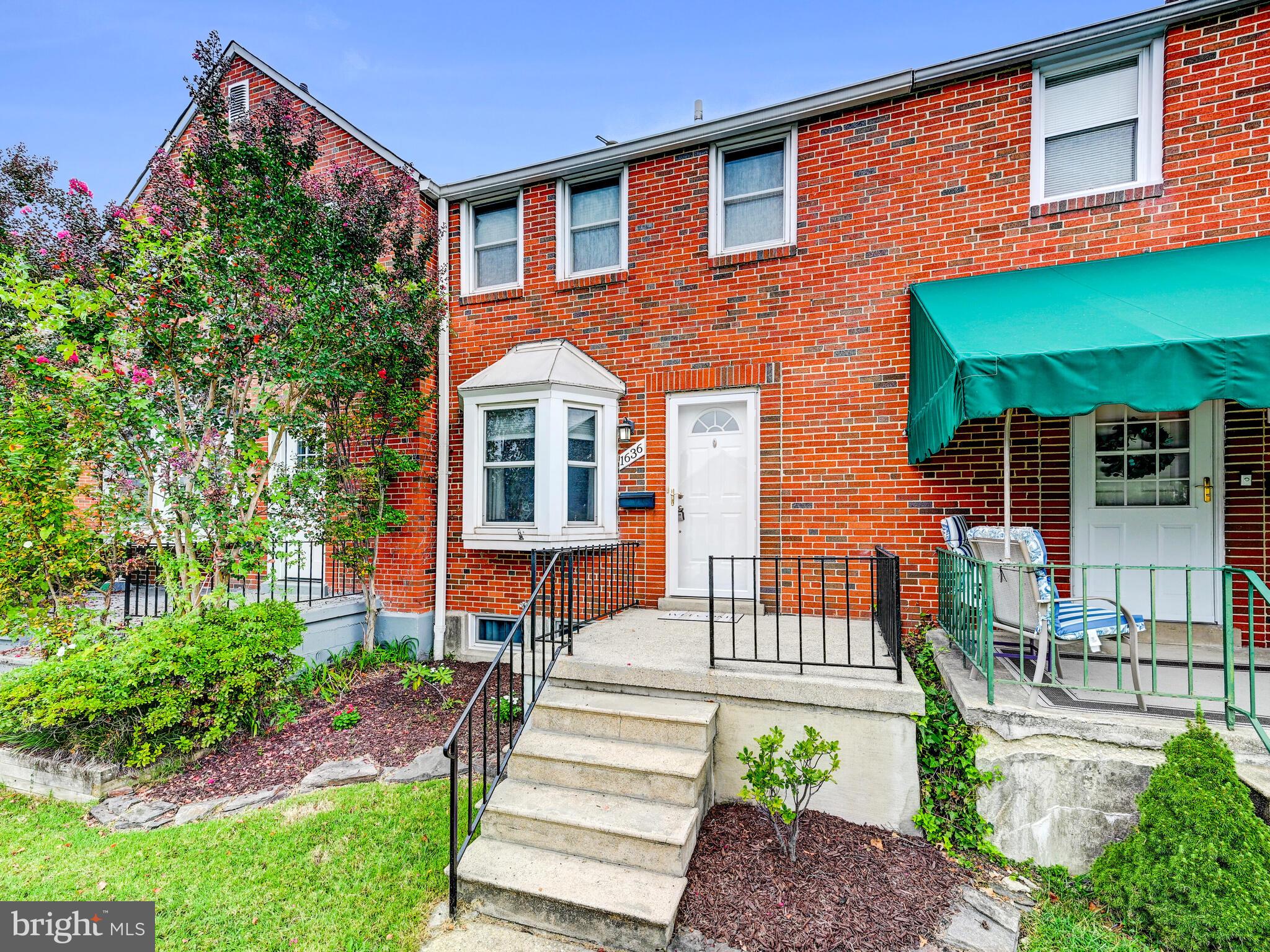 1636 Thetford Road Baltimore, MD 21286 - Photo 3 of 40 a front view of a house with a yard