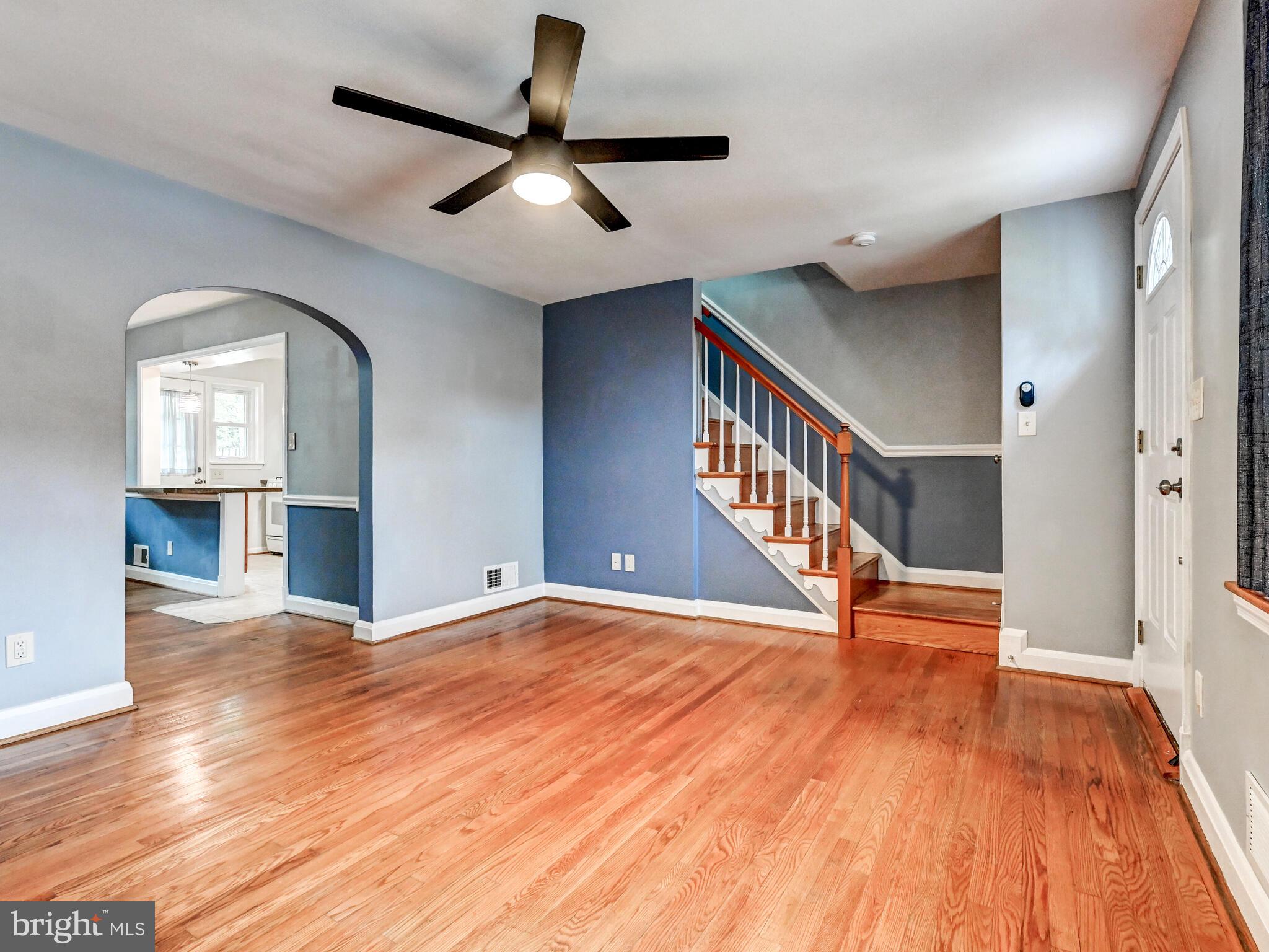 1636 Thetford Road Baltimore, MD 21286 - Photo 40 of 40 a view of an empty room with wooden floor and a window