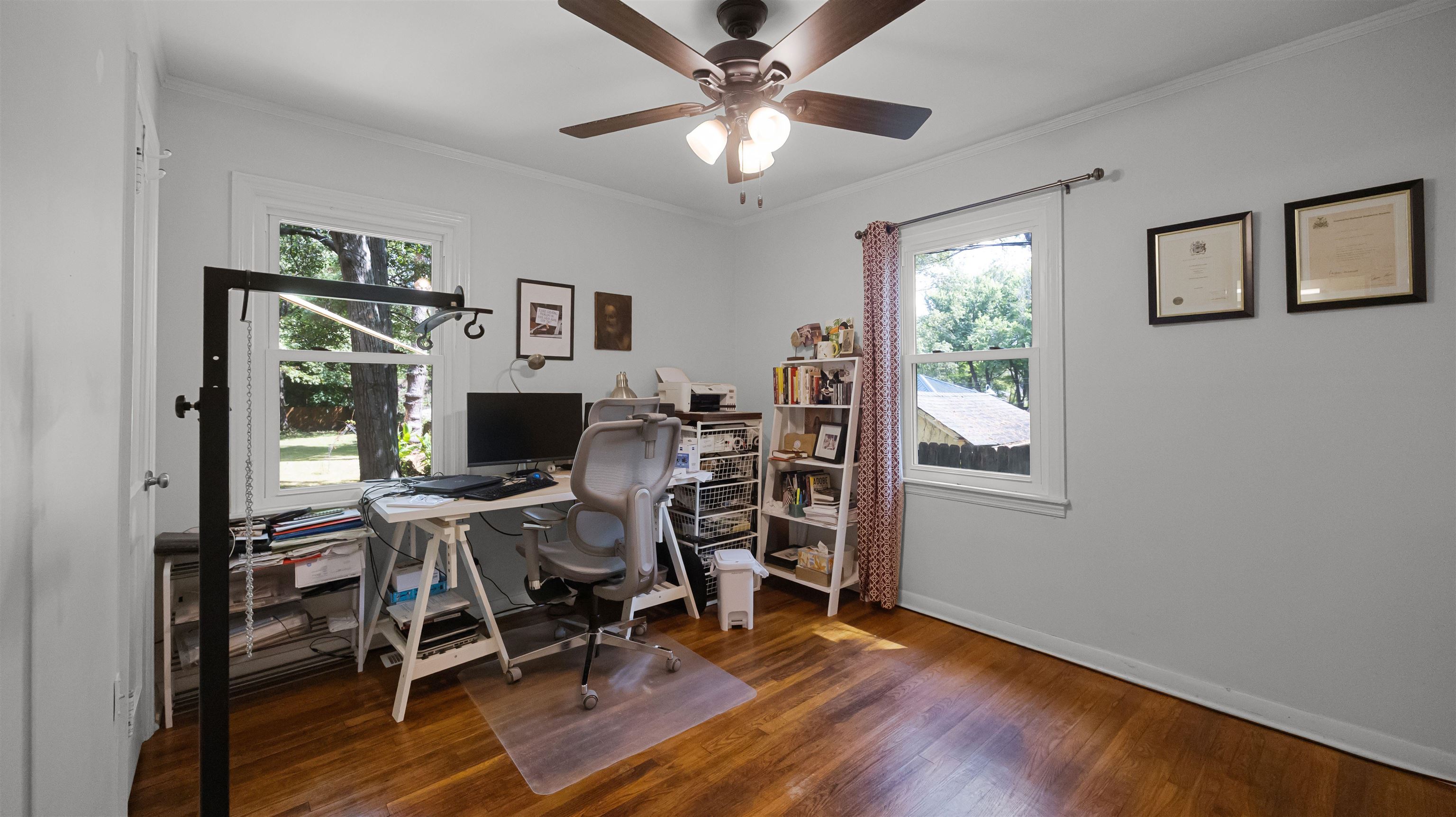 144 Sycamore Road Collierville, TN 38017 - Photo 6 of 11 Home office featuring dark wood-style flooring, ornamental molding, and a ceiling fan