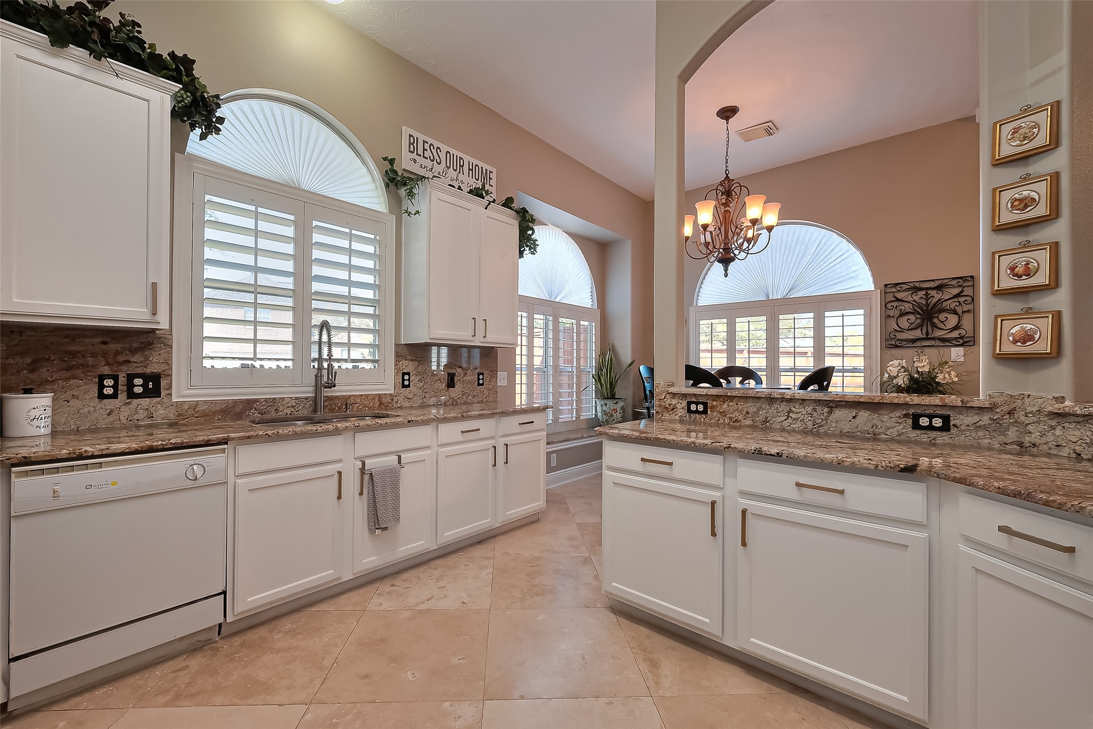 3007 Country Boy Court Spring, TX 77373 - Photo 11 of 31 a kitchen with a sink stove and cabinets