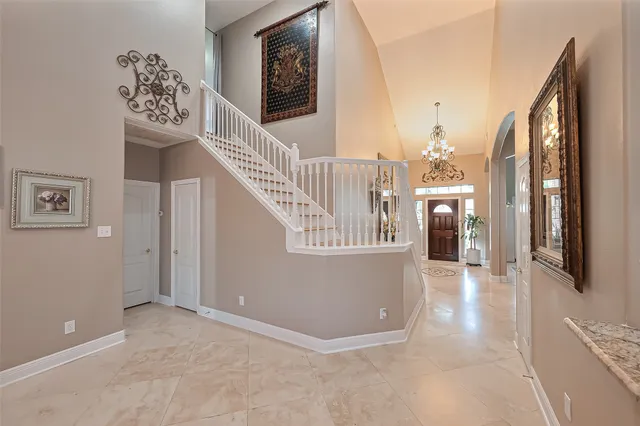 a view of a hallway with entryway