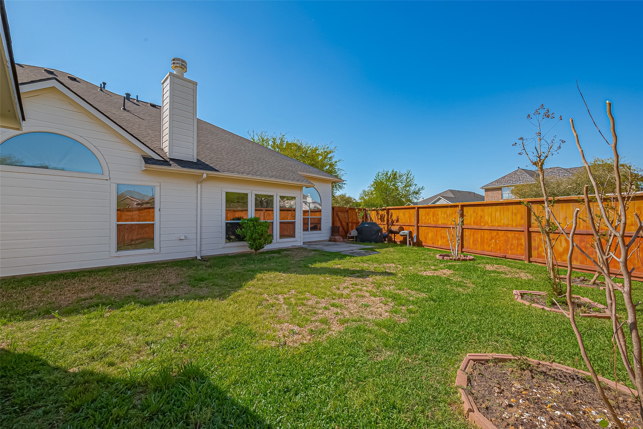 3007 Country Boy Court Spring, TX 77373 - Photo 31 of 31 a view of a house with a backyard