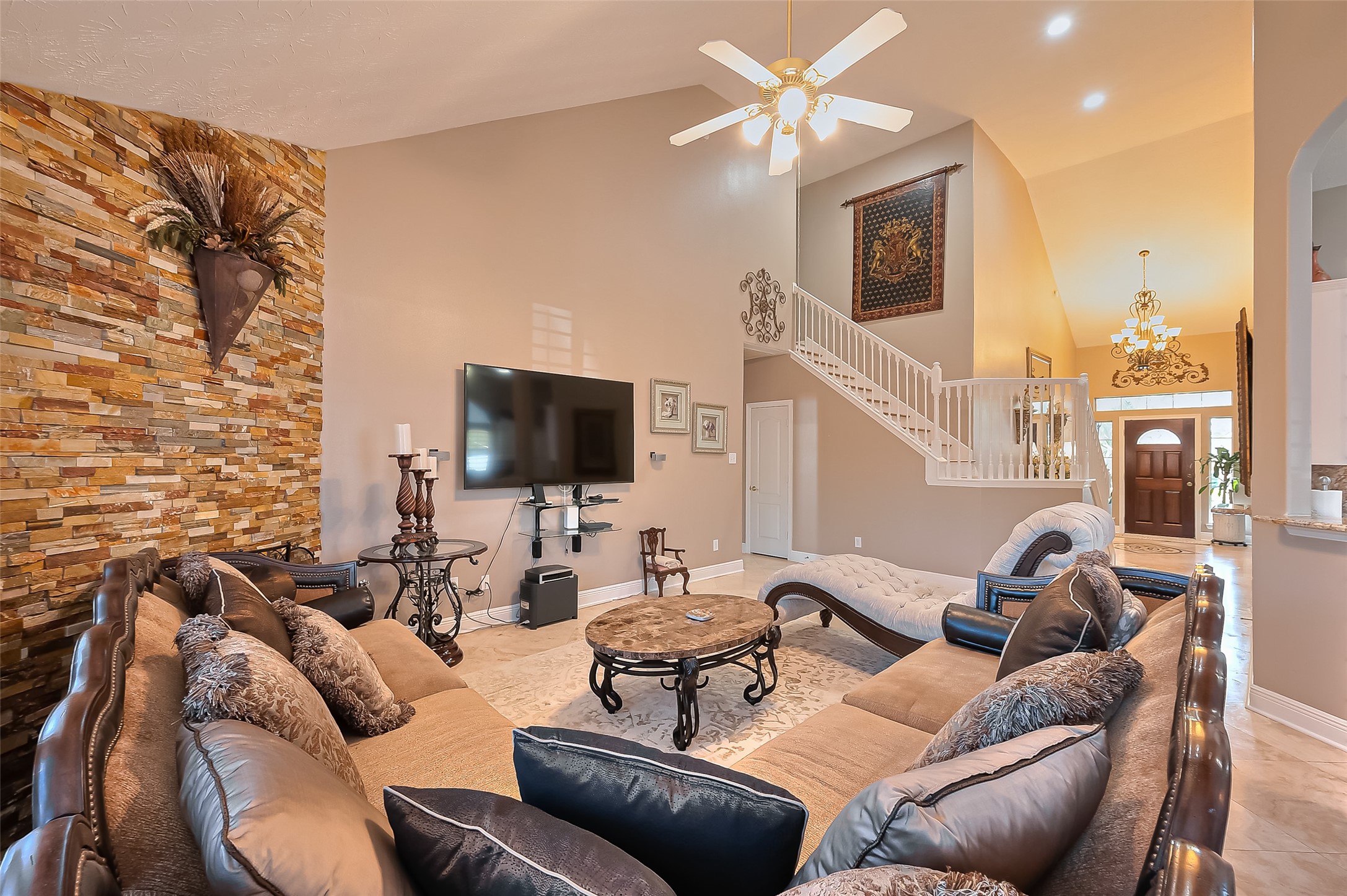 3007 Country Boy Court Spring, TX 77373 - Photo 8 of 31 a living room with furniture a flat screen tv and kitchen view