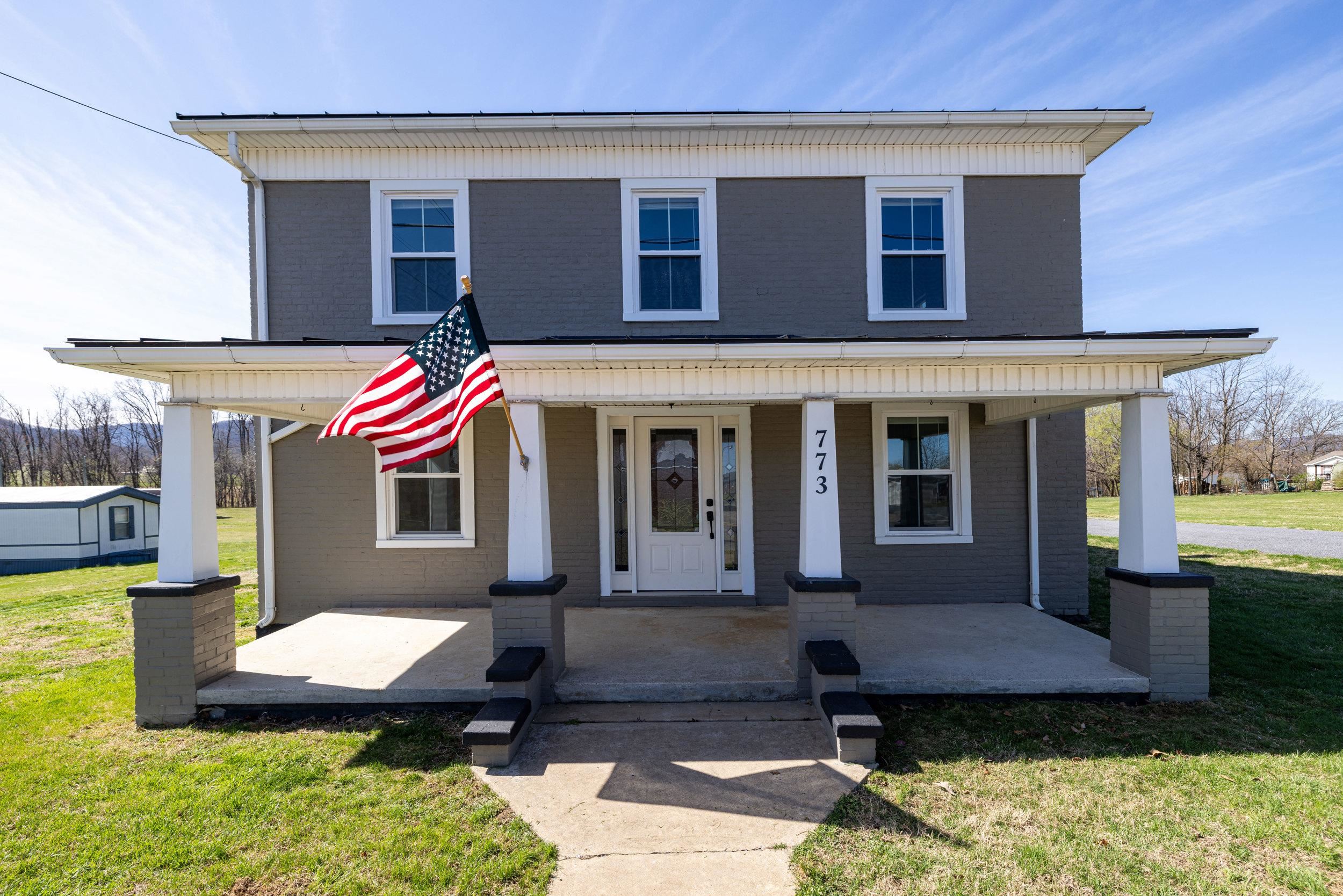 773 West Main Street Stanley, VA 22851 - Photo 1 of 66 a front view of a house with a yard