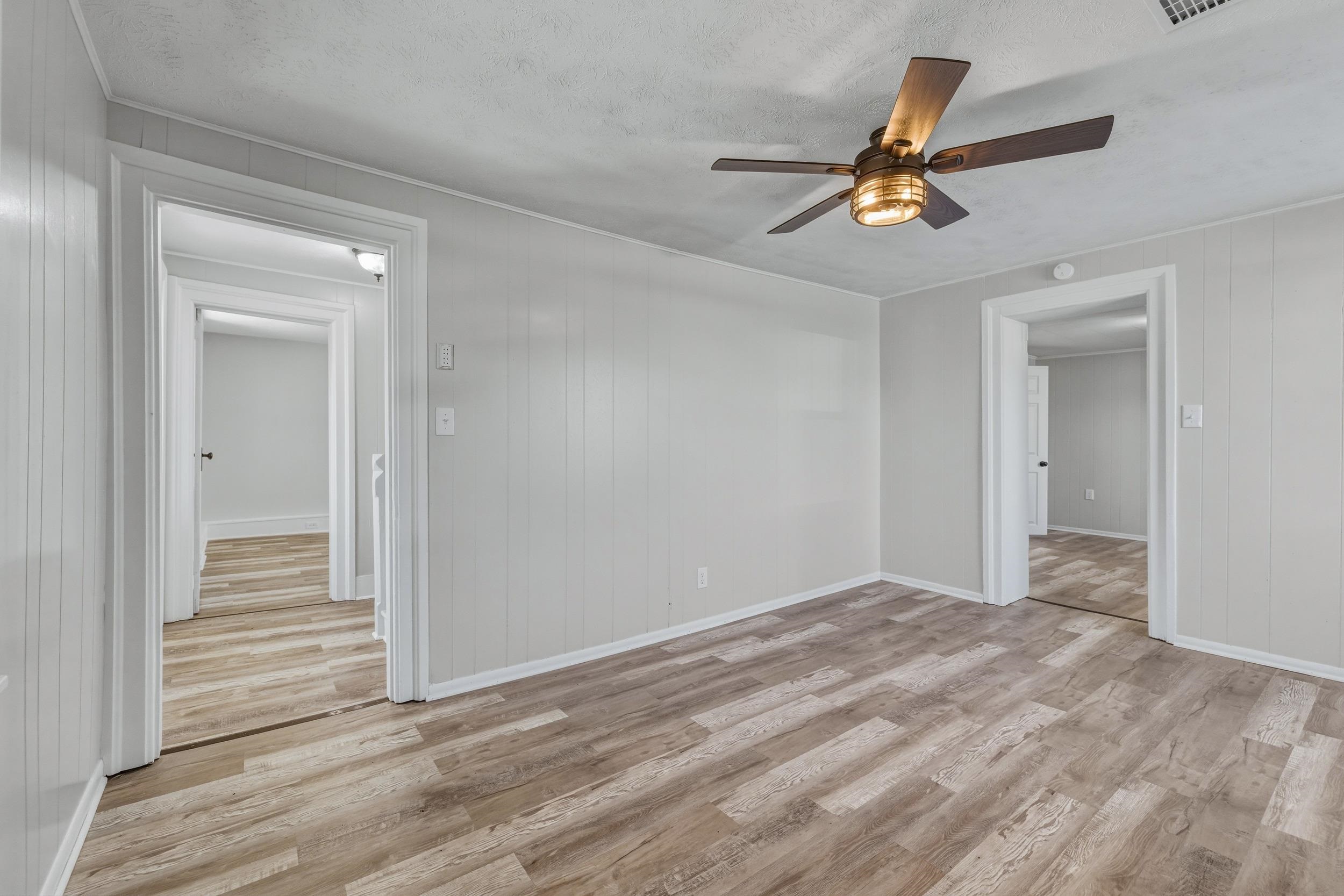 773 West Main Street Stanley, VA 22851 - Photo 12 of 66 a view of a livingroom with a ceiling fan and window