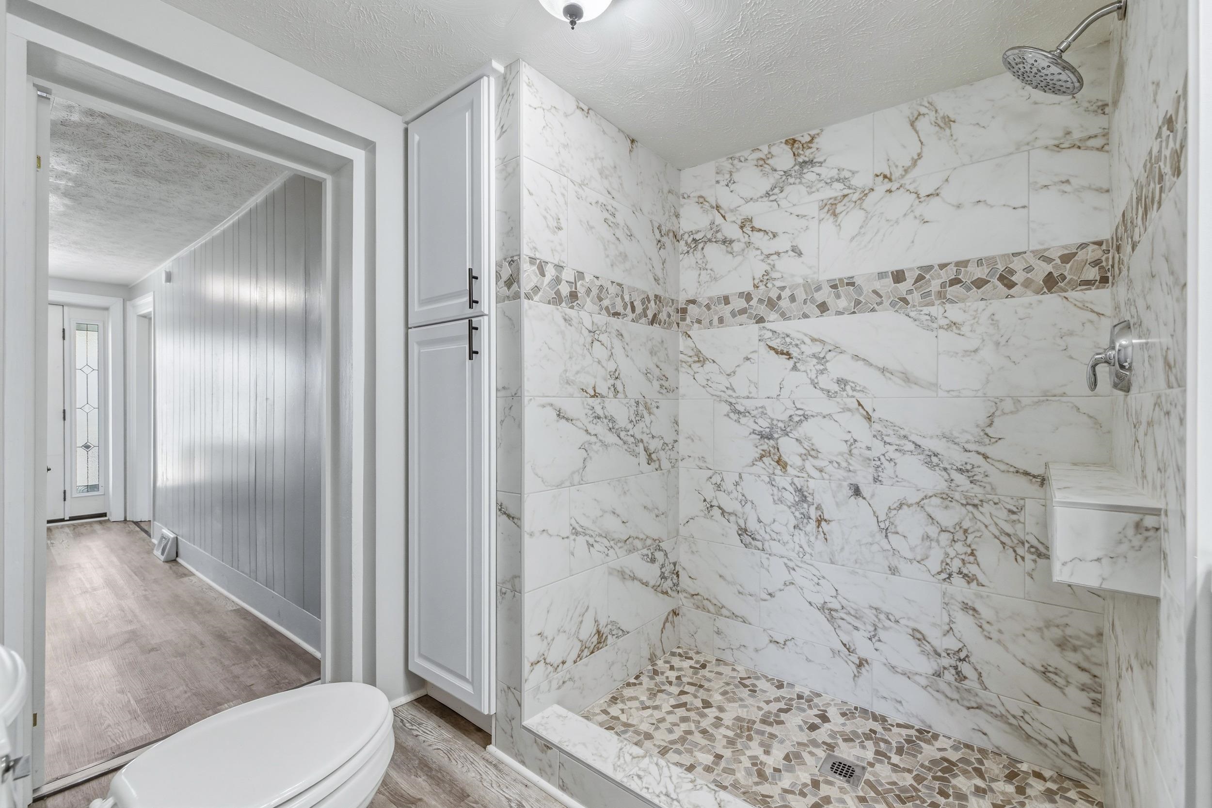 773 West Main Street Stanley, VA 22851 - Photo 20 of 66 a bathroom with a toilet and a shower
