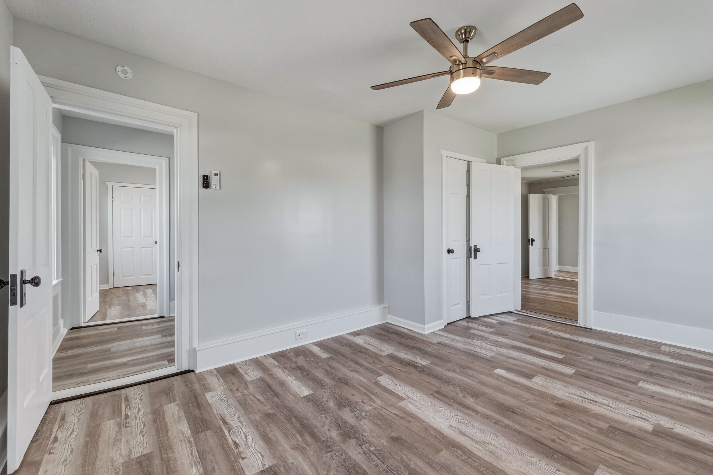 773 West Main Street Stanley, VA 22851 - Photo 25 of 66 wooden floor in an empty room with a window