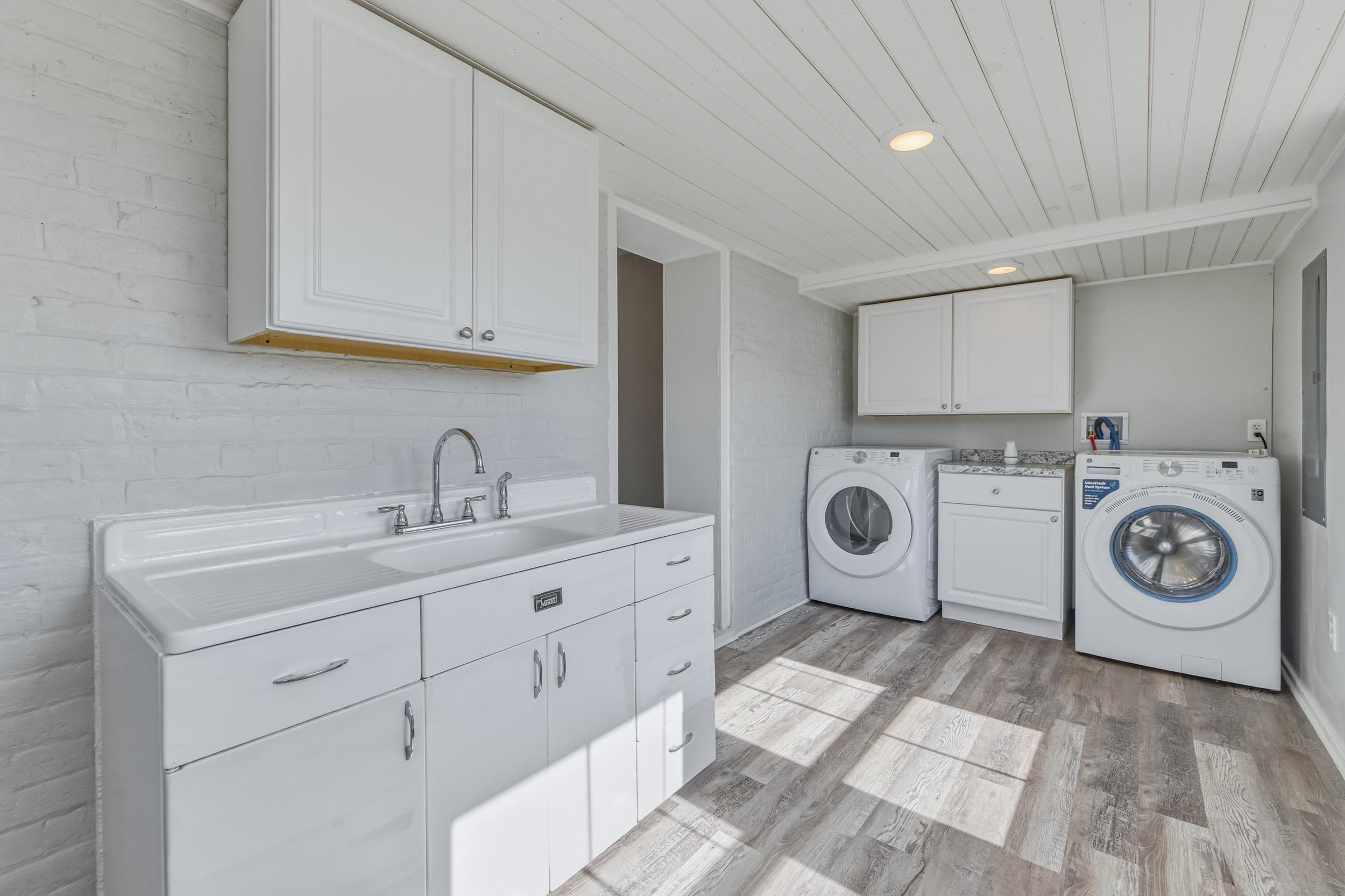 773 West Main Street Stanley, VA 22851 - Photo 36 of 66 a utility room with sink dryer and washer