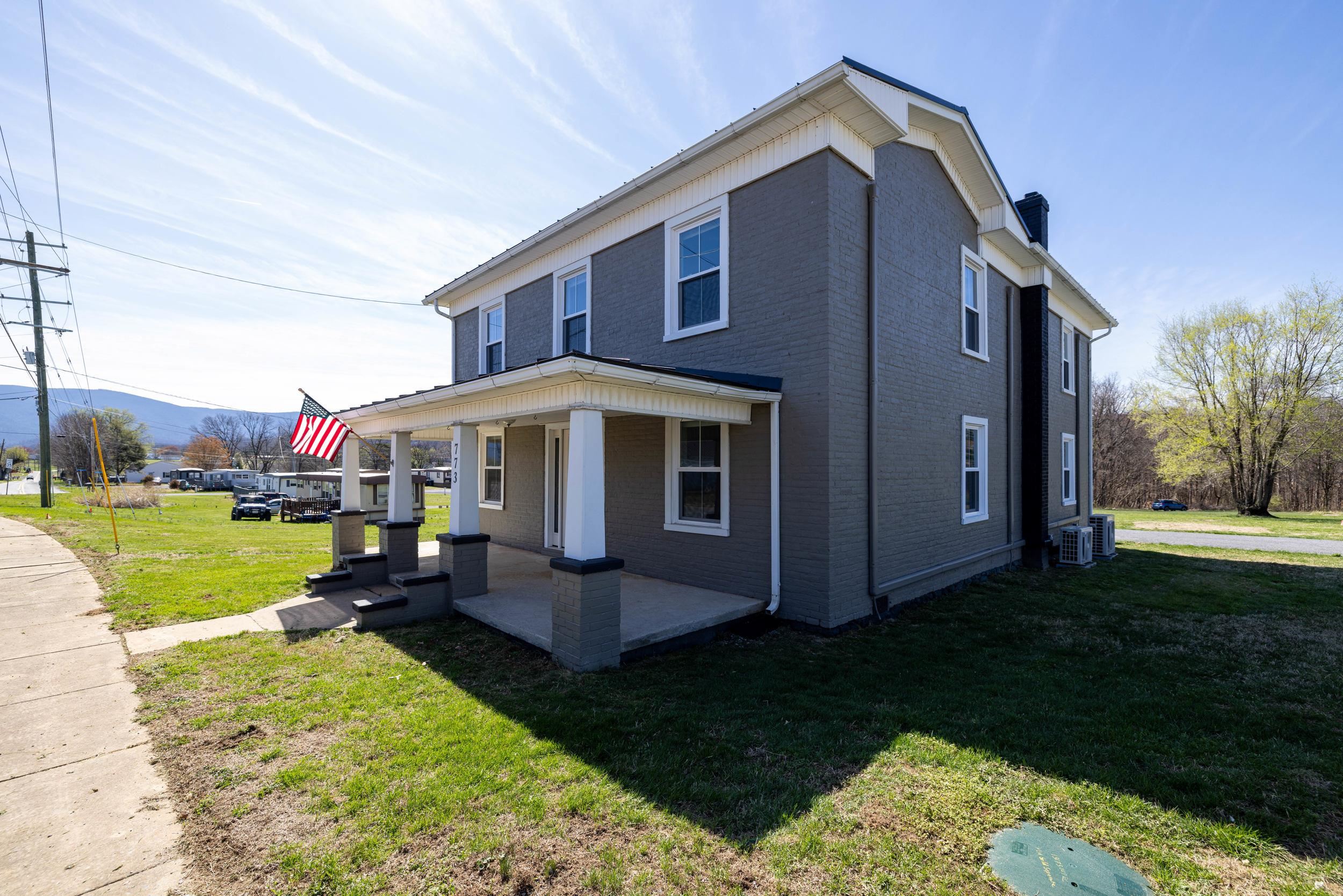 773 West Main Street Stanley, VA 22851 - Photo 38 of 66 a front view of a house with garden