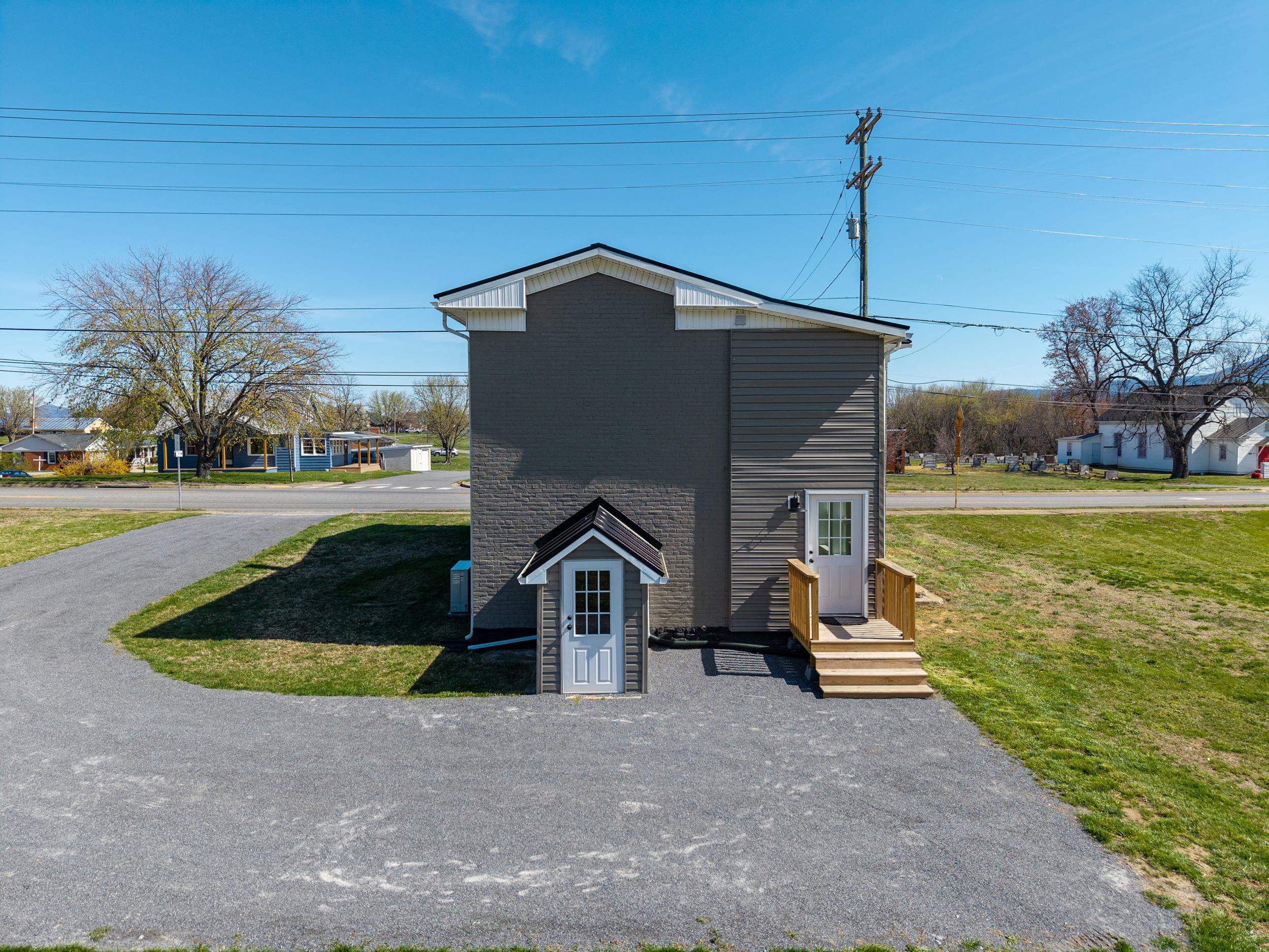 773 West Main Street Stanley, VA 22851 - Photo 43 of 66 a front view of a house with garden